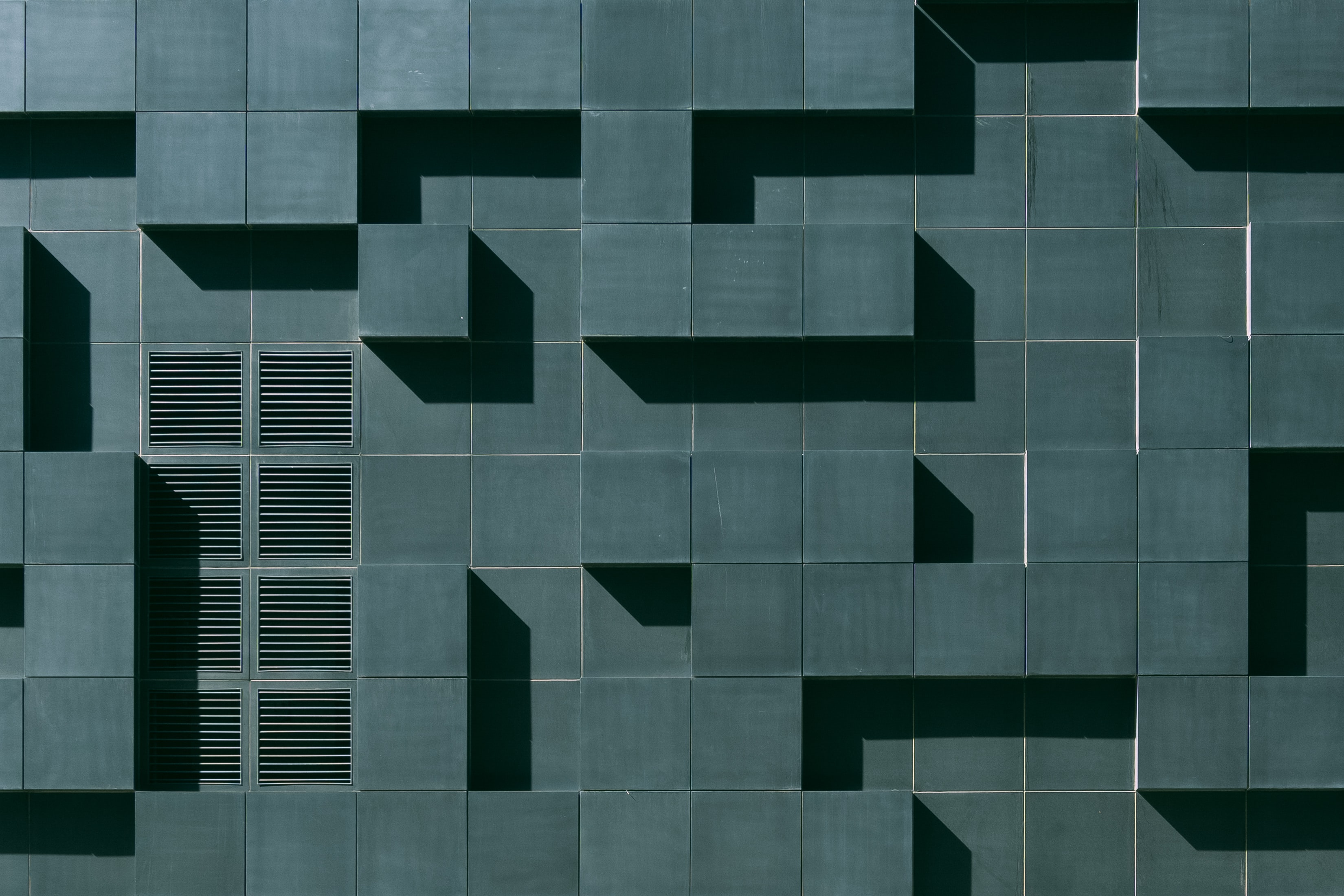 Black Contemporary Facade Detail.. Photo by Vlado Paunovic on Unsplash